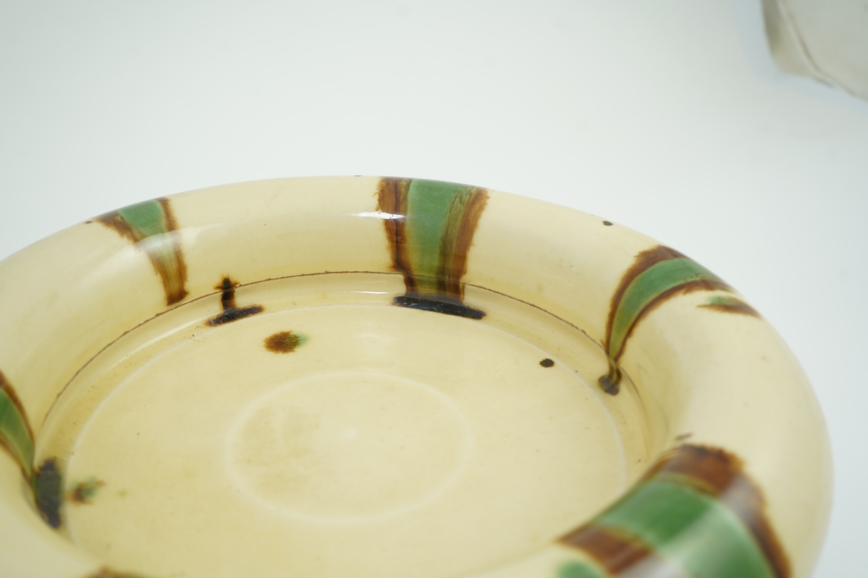 Takeshi Yasuda (Japanese, b.1943): A tricolour stoneware tripod planter